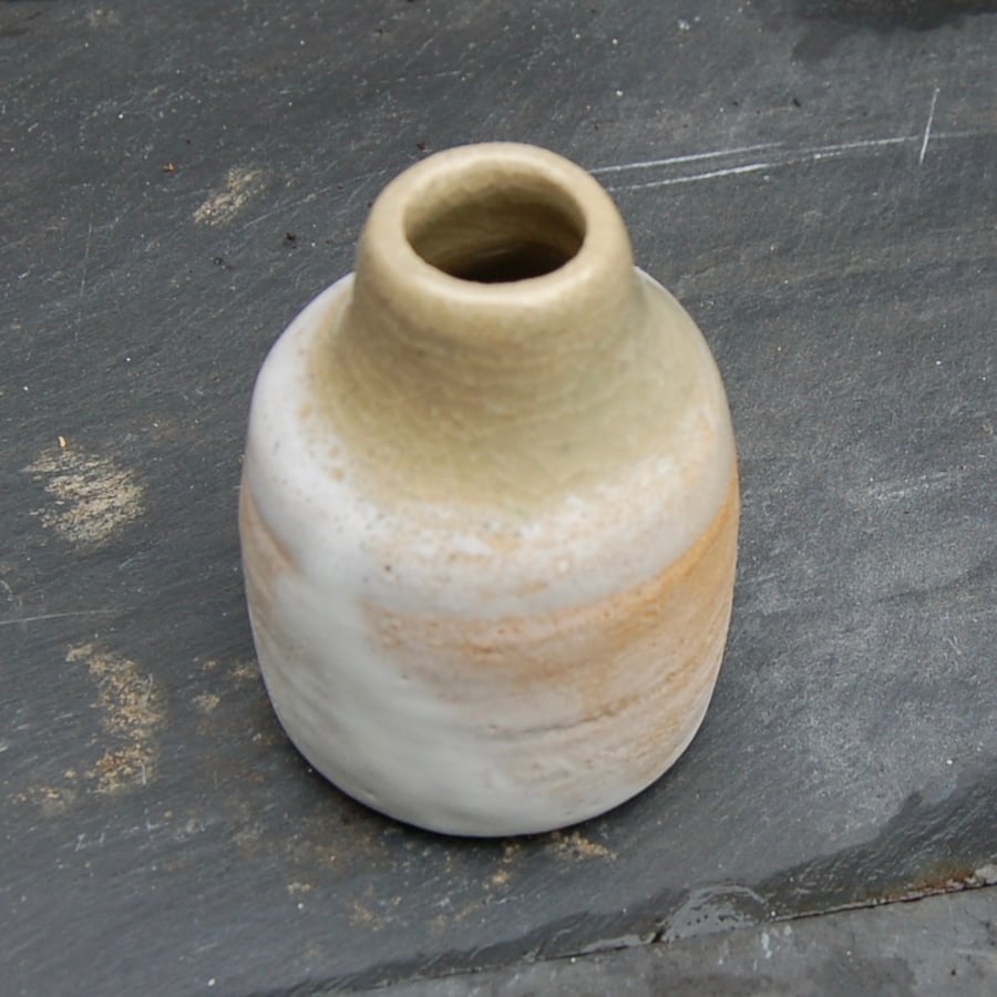 Rustic stoneware bottle with antique glaze effect