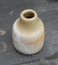 Rustic stoneware bottle with antique glaze effect