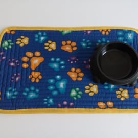 Cat or Dog Placemat in blue with paw print design for cat or dog