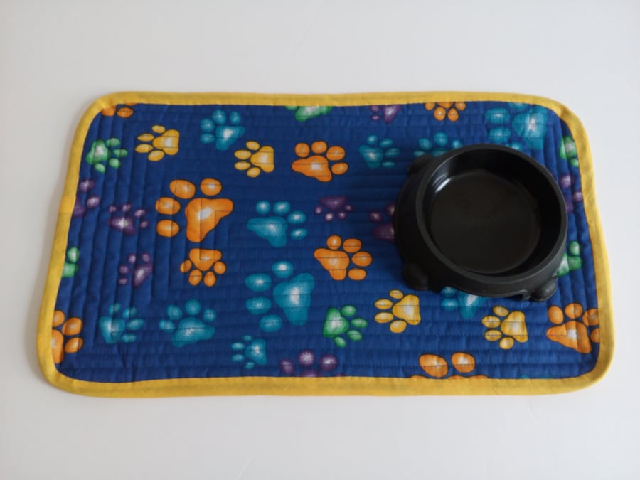Cat or Dog Placemat in blue with paw print design for cat or dog