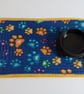 Perfectly imperfect Cat or Dog Placemat in blue with paw print design