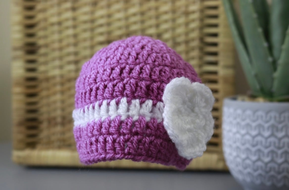 2 x baby girl hats- newborn size