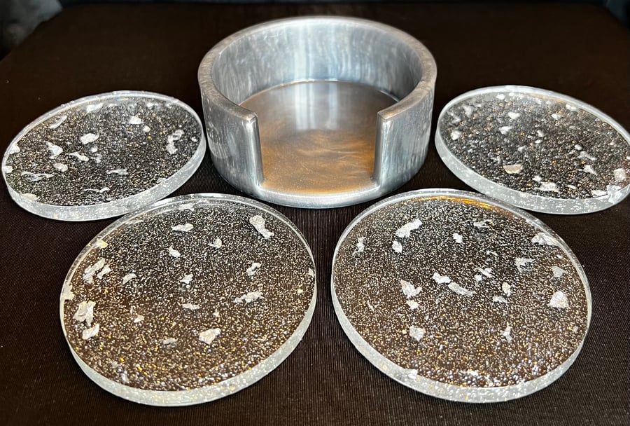 Set of 4 silver coasters with holder