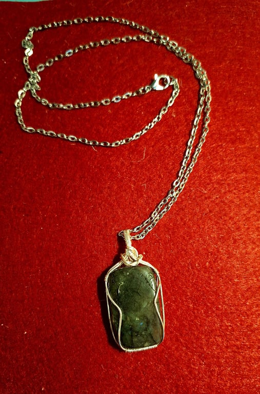 Labradorite oblong stone wrapped in silver plated