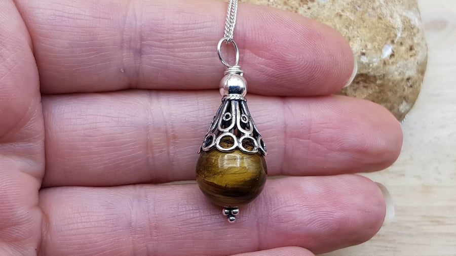 Small Tigers eye pendant. Reiki jewelry. Capricorn jewelry uk