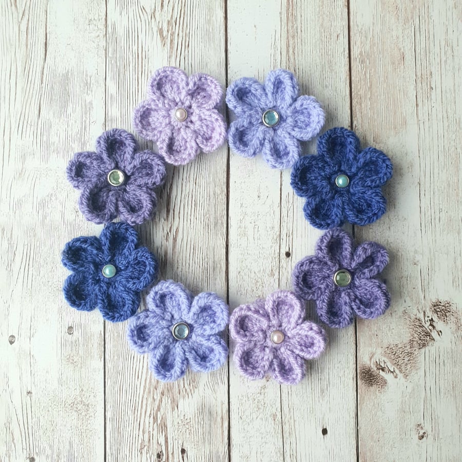 8 crocheted 5 petal flowers 