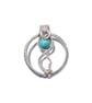 Turquoise beaded wire wrapped circular pendant - Image 1
