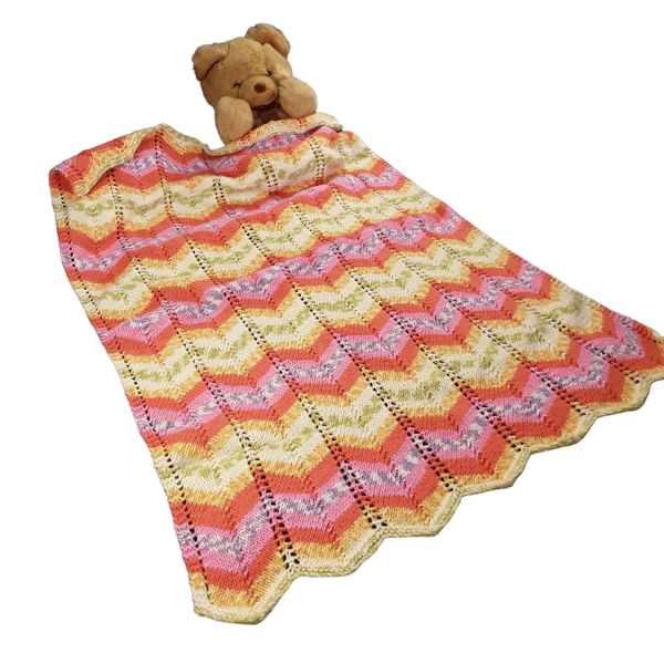 Hand knitted baby pram blanket - multi colour chevron 