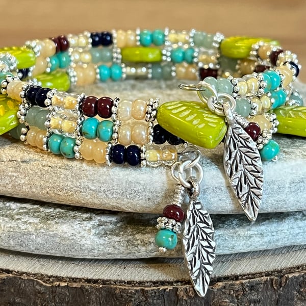 Colourful beaded memory wire wrap bracelet with lime green Czech leaves