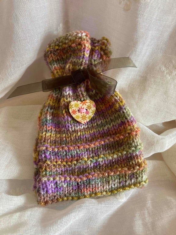 Unique knitted gift bag with wooden floral heart