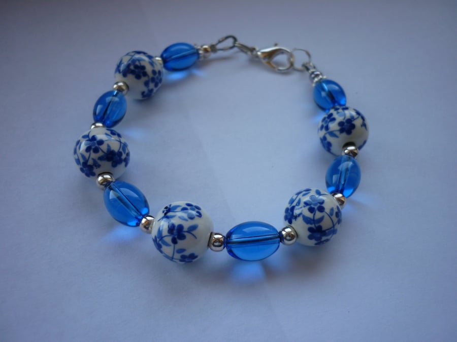 BLUE, WHITE AND SILVER - PORCELAIN BEAD BRACELET.