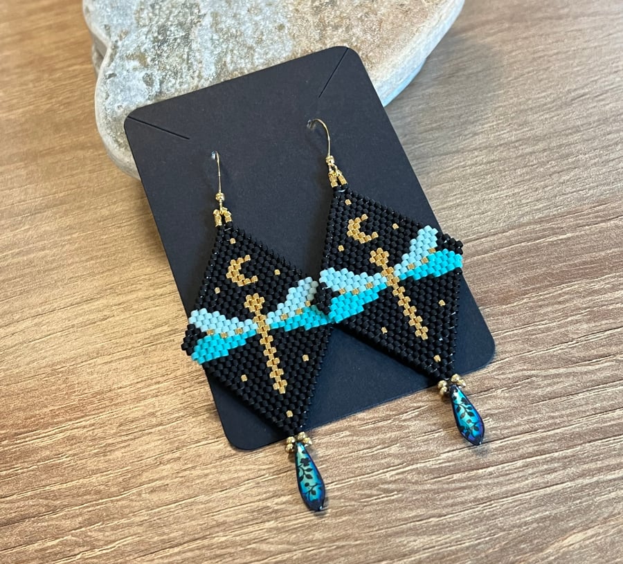 Beaded dragonfly earrings in turquoise black and gold with a Czech teardrop 