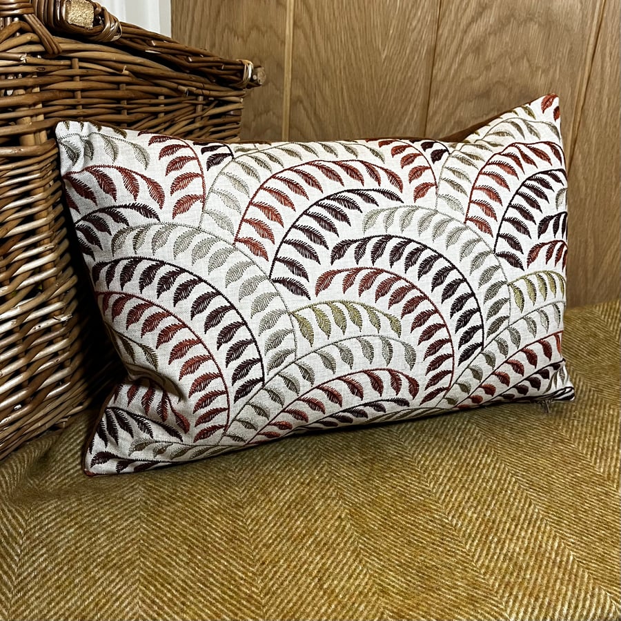 Embroidered linen cushion with leafy pattern autumnal colours velvety back