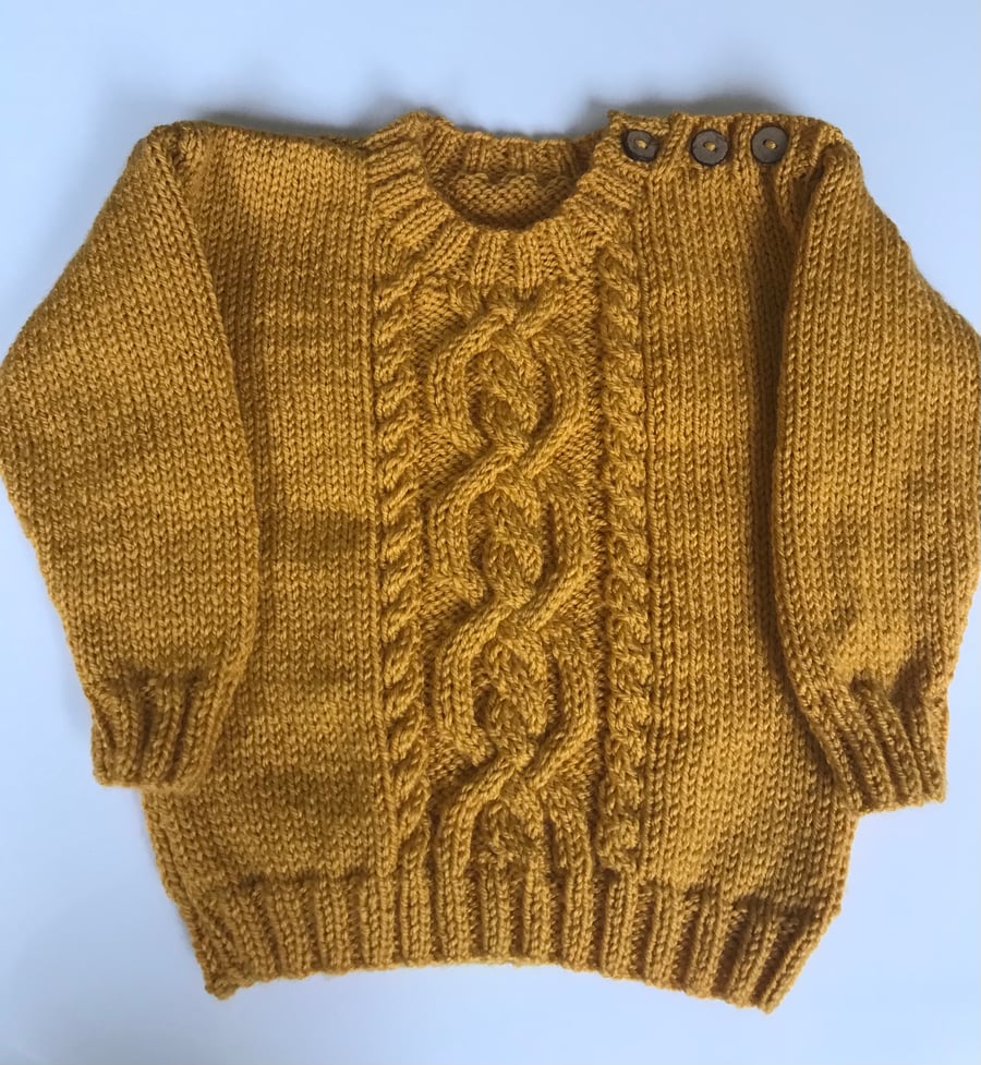 Hand knitted Aran baby jumper 