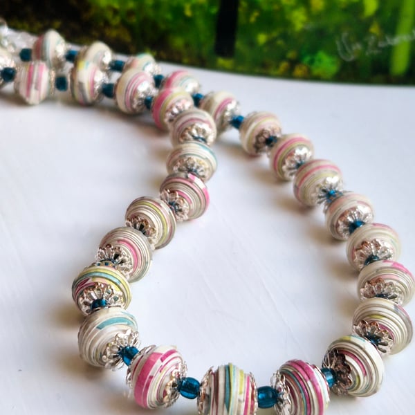 Multicoloured paper beaded necklace with blue glass separators