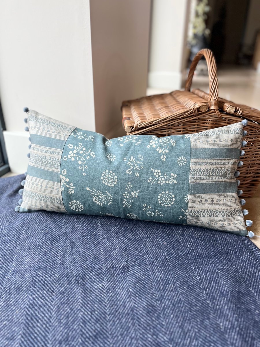 Long linen cushion cover blue with pompoms