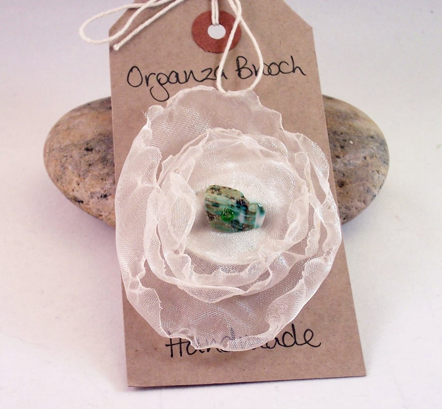Hand stitched organza and shell brooch - Perseus