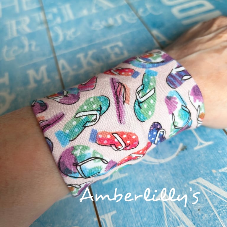 Wide bracelet wrist cover in flip flop fabric design 
