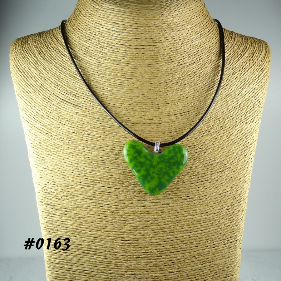 Green handcrafted fused glass heart pendant on a black leather cord (0163)