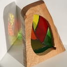 ‘Changing Seasons’ One of a kind stained glass leaf in a solid wood frame.