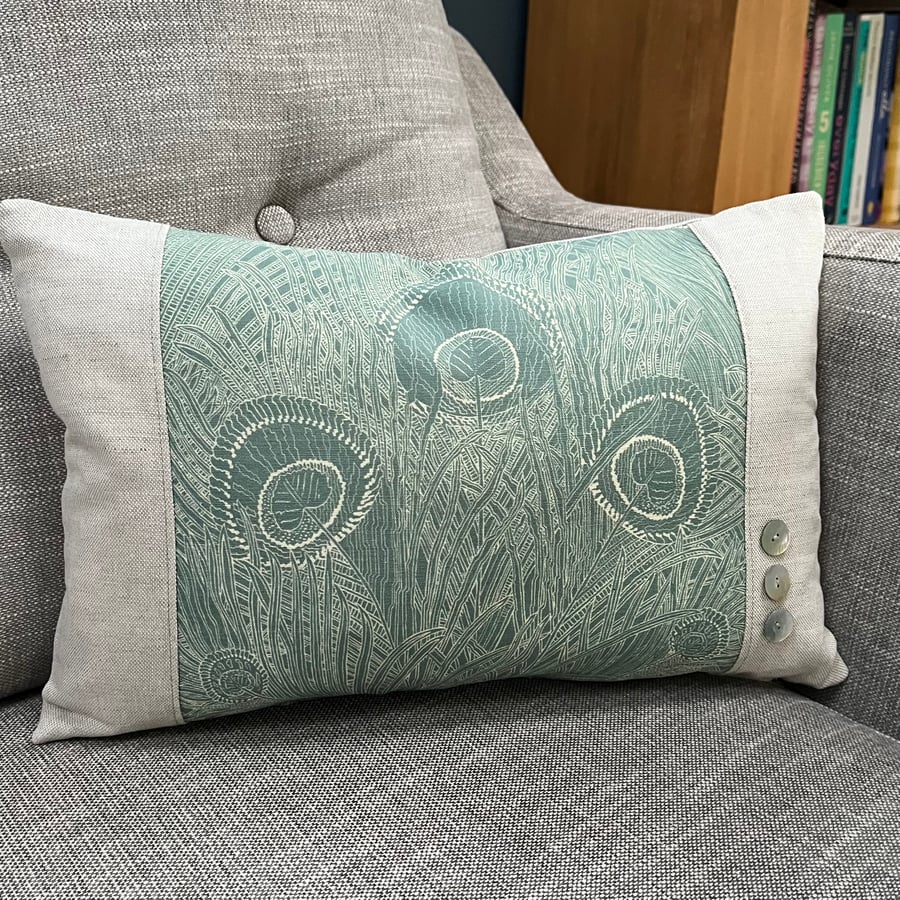 Liberty Hebe peacock feather linen cushion cover with mother of pearl buttons