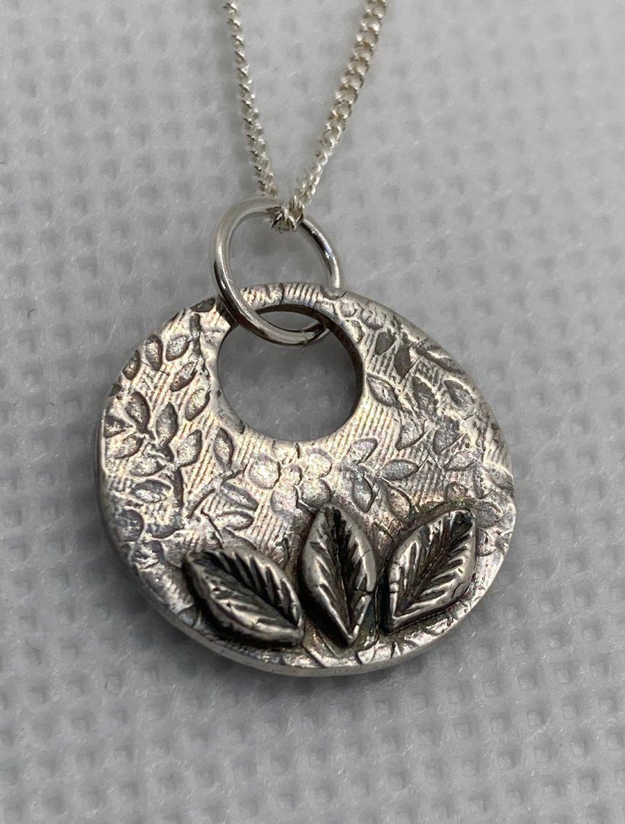 Unusual, pure silver necklace with handmade leaves. 