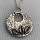 Unusual, pure silver necklace with handmade leaves. 