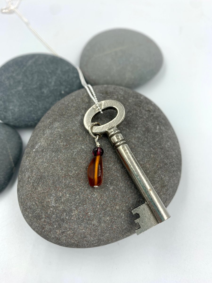 Vintage key pendant with amber beads on silver chain