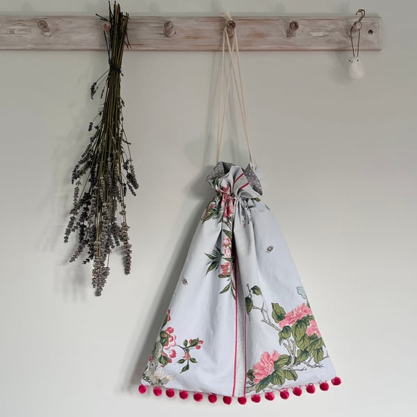 Drawstring bag in Chinese Flowers reclaimed cotton with pompoms 