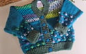 HAND KNITTED DESIGNER BABY CARDIGANS, JACKETS & GIFT SETS