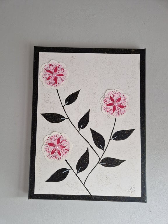 A collage of camellias on canvas. 