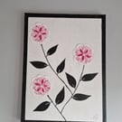 A collage of camellias on canvas. 