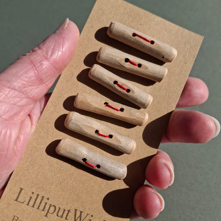 Six driftwood toggle buttons