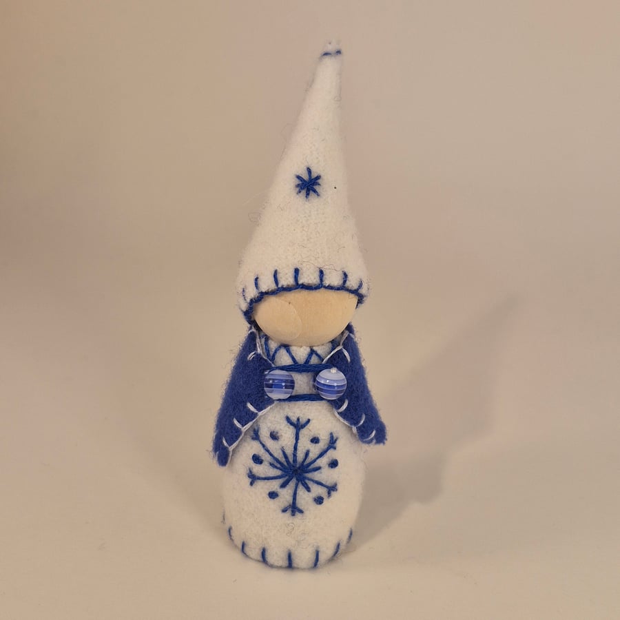 Large wintery gnome with snowflake decorations