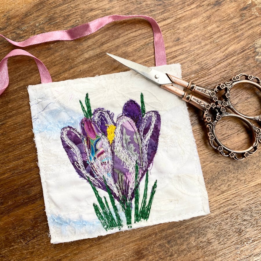 Embroidered up-cycled crocus home decoration.