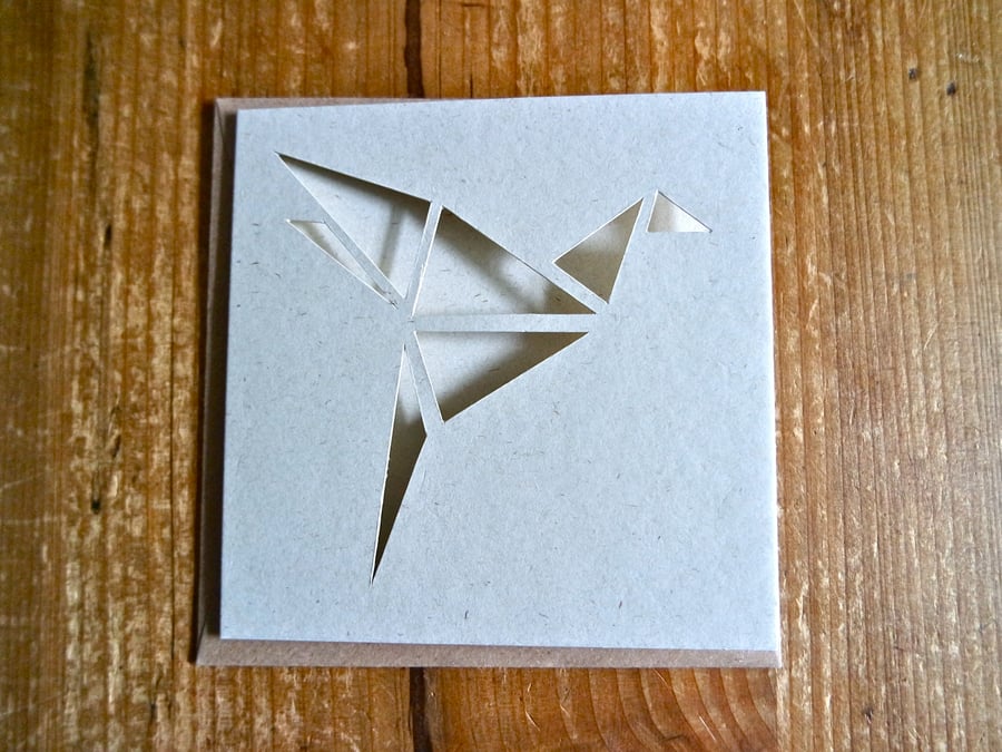 Card with origami style bird cut-out-pattern