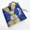 Hare and moon needle, pin and safety pin case.  
