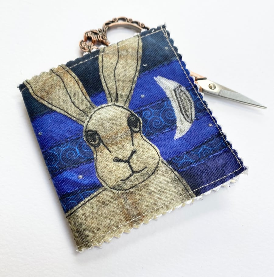 Hare and moon needle, pin and safety pin case.  