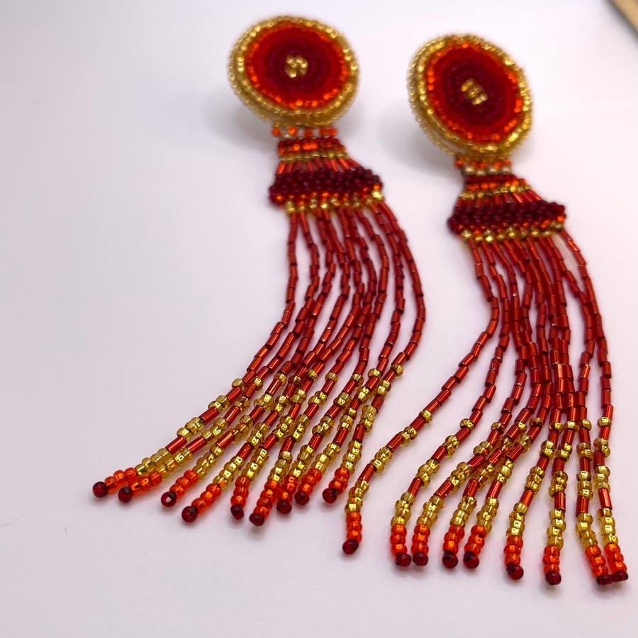 Unique Red & Gold beaded handmade earrings. Chandelier style with stud fittings