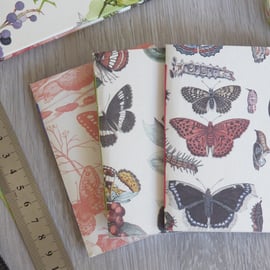 Set of three handbound small A7 notebooks with butterfly paper covers