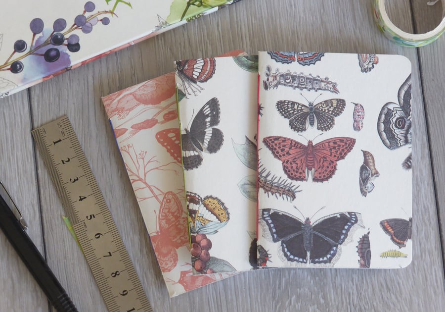 Set of three handbound small A7 notebooks with butterfly paper covers