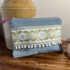 Reclaimed denim and embroidered braid zip pouch with mini pompom trim