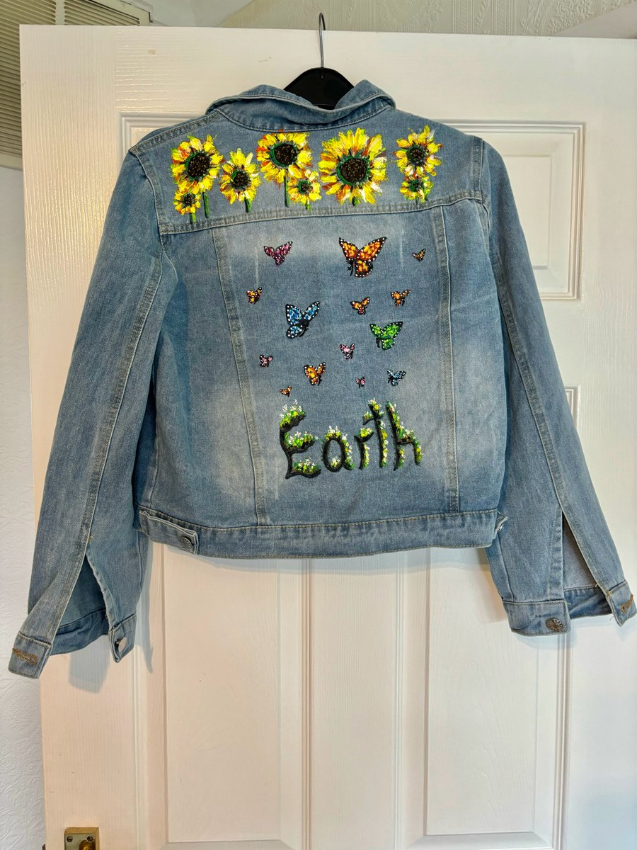 A hand painted and sealed jacket by Andrew Jenkins