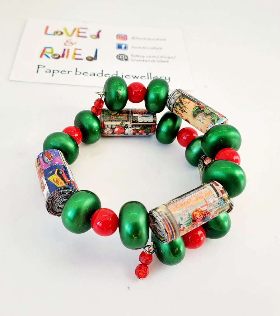 Vibrant memory wire bracelet made with Christmas paper  and preloved beads