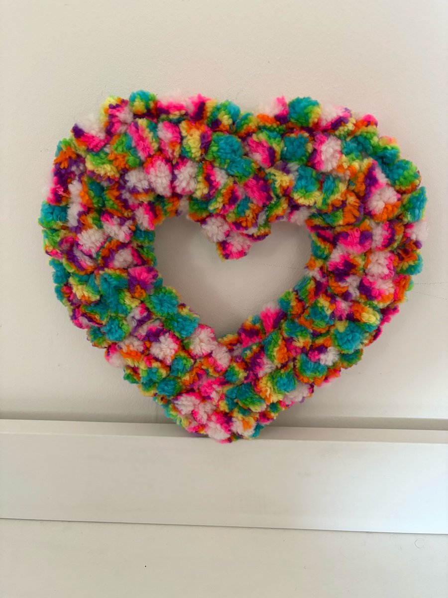 Rainbow decorated woolly Pom Pom wood heart. 