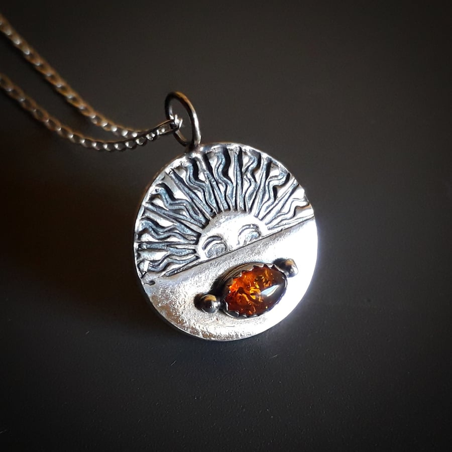 Sun dancer amber pendant, silver necklace