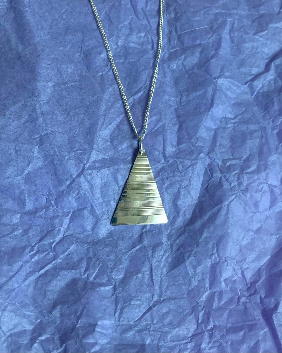 Striped silver triangle napkin ring necklace