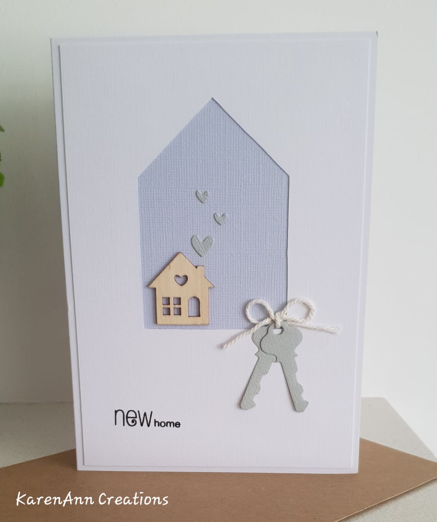 New home card with wooden house detail