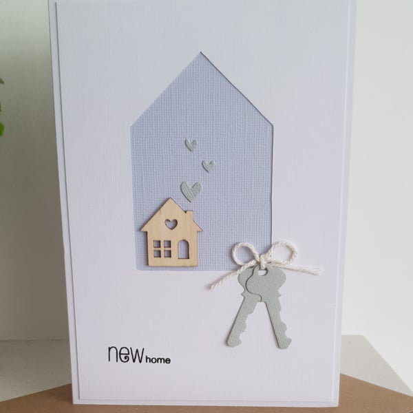 New home card with wooden house detail