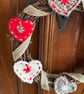 Scandi-style Christmas wreath made from crocheted hearts and ribbon - Image 3
